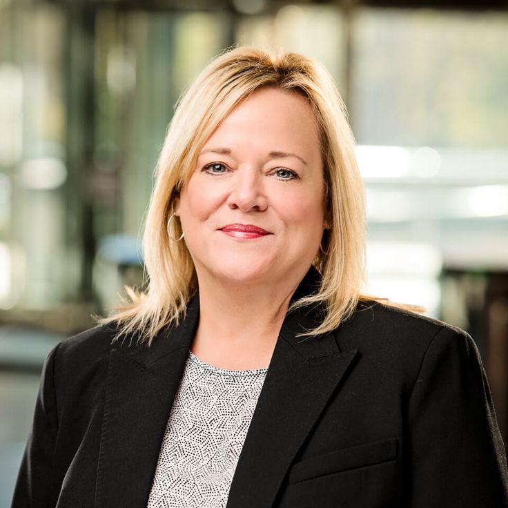 Professional portrait of executive member showcasing leadership qualities